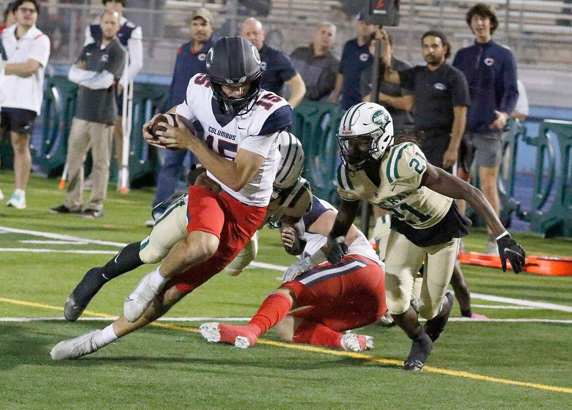 Columbus Explorers quarterback Alberto Mendoza (15) goes to score a touchdown against Miami Central Rockets during football game on Friday, October 21, 2022 at Traz Powell Stadium in Miami. Andrew Uloza / for Miami Herald