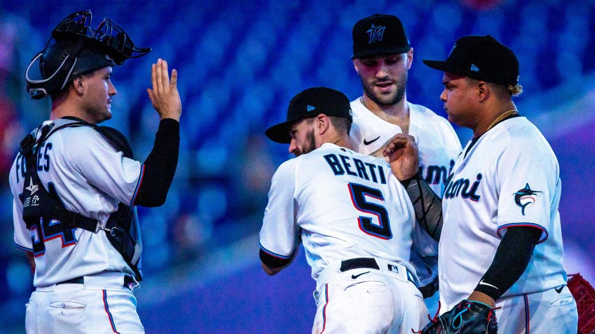 Miami Marlins players celebrate a 3-2 win over the Colorado Rockies after the ninth inning of an MLB game at loanDepot park in the Little Havana neighborhood of Miami, Florida, on Thursday, June 23, 2022.