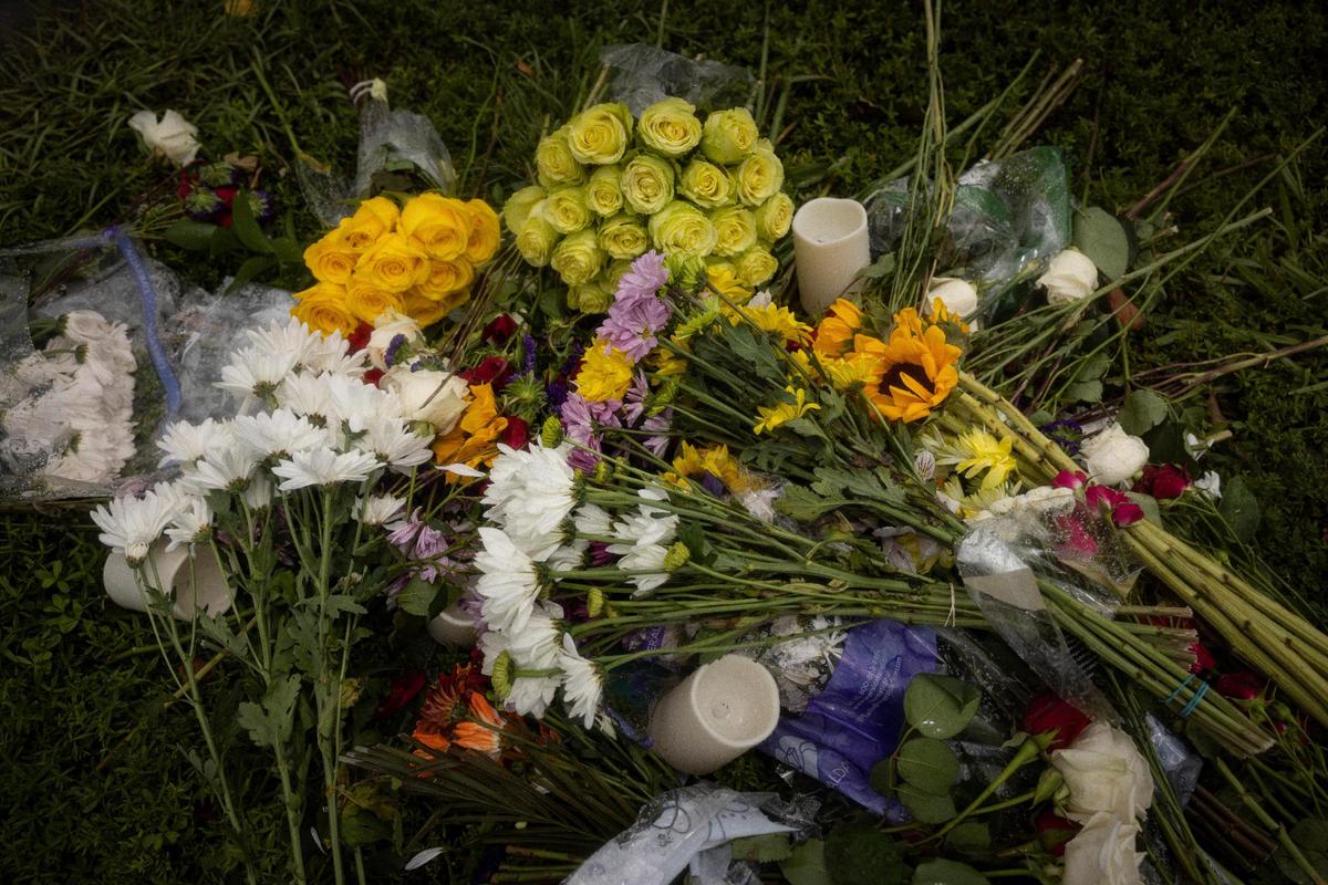 Flowers for Lolita sit outside the Miami Seaquarium lawn two days after Lolita’s death on Sunday, Aug. 20, 2023, on Rickenbacker Causeway before Key Biscayne.