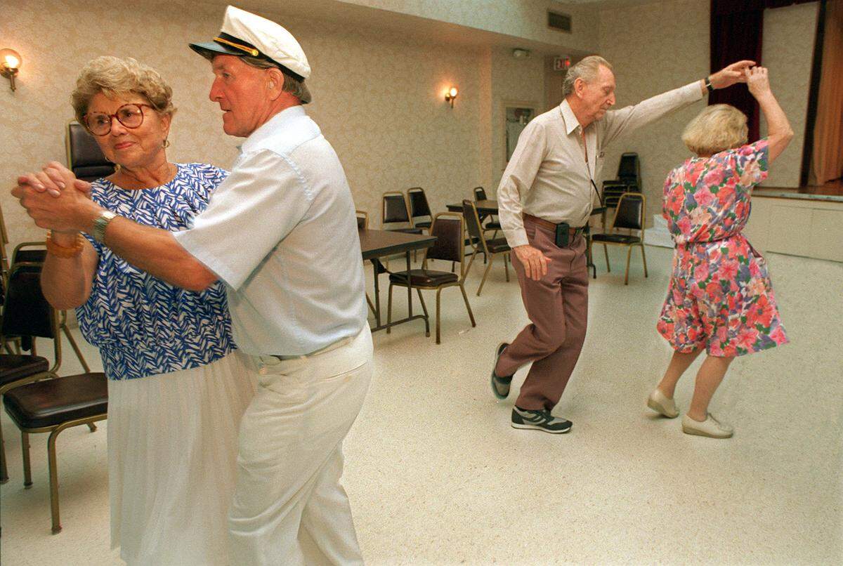 Tina and Edmond Szymura, left, Standley and Eugenia Brzeski enjoy Polka dance in 1995 at the Surfside Community Center during the Surfside annual International Festival-Octoberfest.