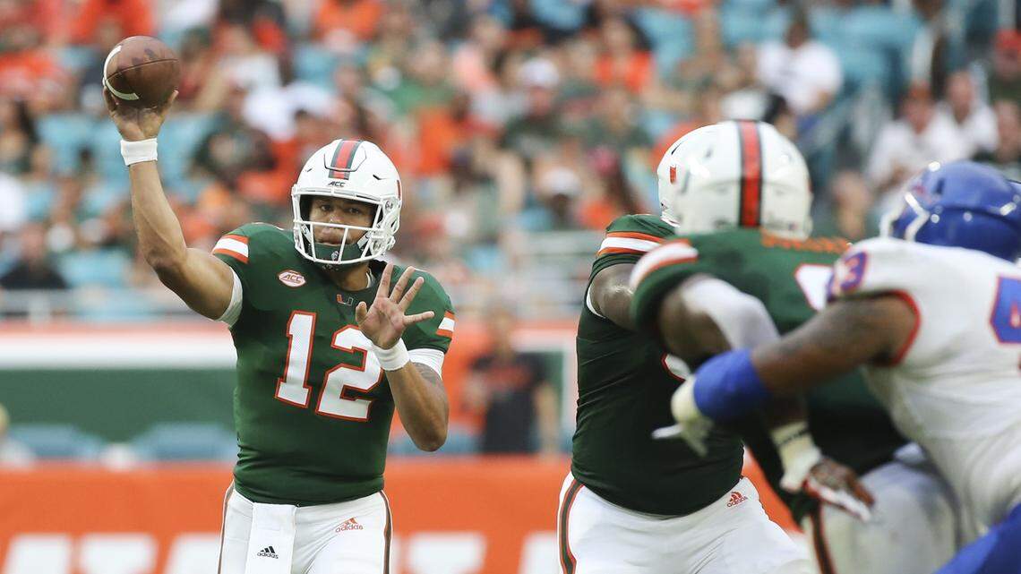 Miami Hurricanes quarterback Malik Rosier (12) looks to pass in the second quarter as the University of Miami hosts Savannah State at Hard Rock Stadium in Miami Gardens on Saturday, September 8, 2018.