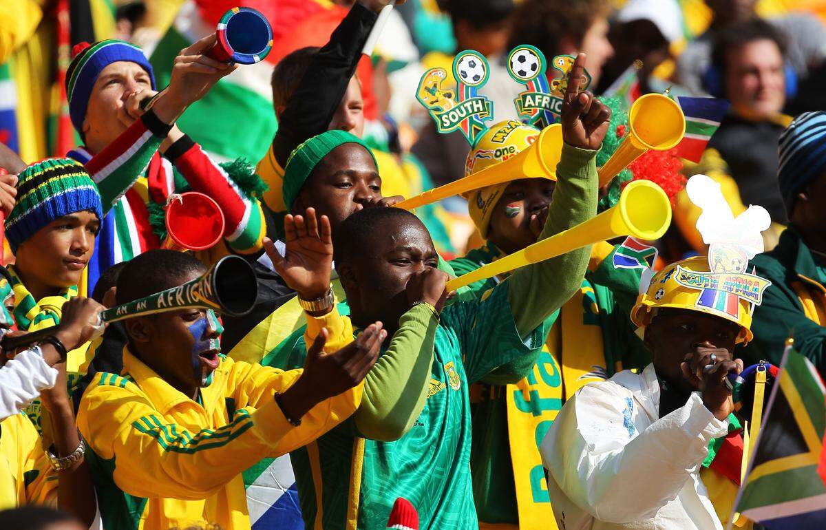 JOHANNESBURG, SOUTH AFRICA - JUNE 11:  South Africa fans blow Vuvuzela's ahead of the Opening Ceremony of the 2010 FIFA World Cup South Africa Group A match between South Africa and Mexico at Soccer City Stadium on June 11, 2010 in Johannesburg, South Africa.  (Photo by Clive Rose/Getty Images)