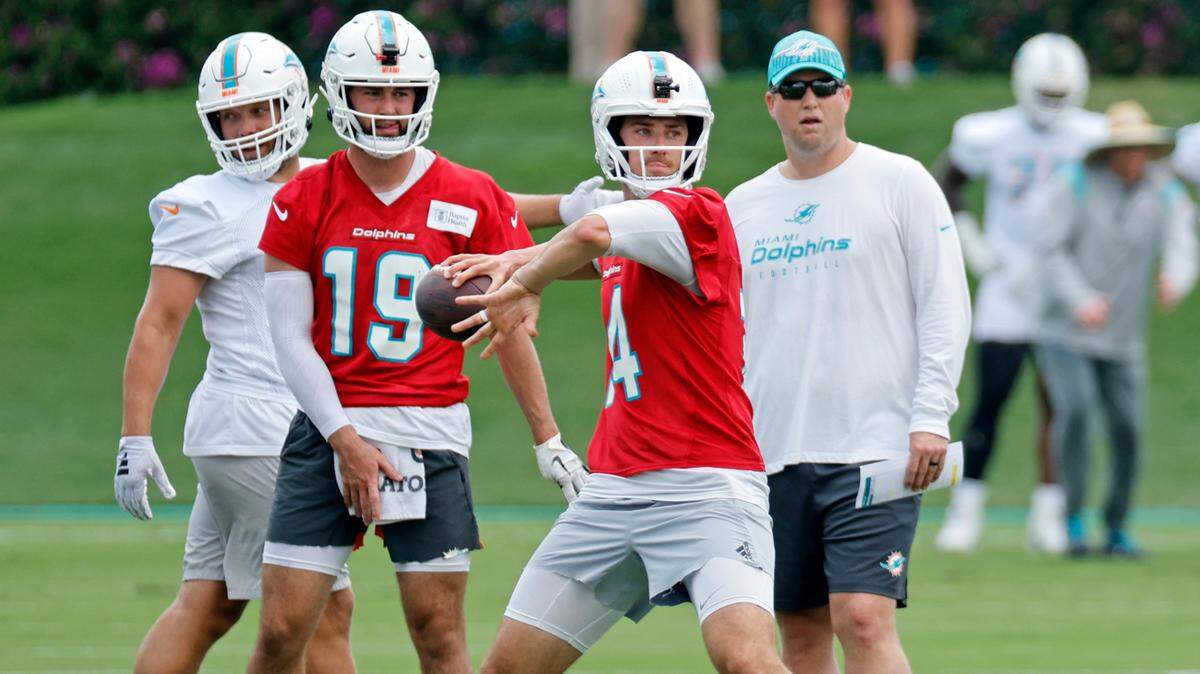 Miami Dolphins quarterback Mike White (14) sets up to pass during practice at the Baptist Health Training Complex in Miami Gardens, FL on Tuesday, May 28, 2024.