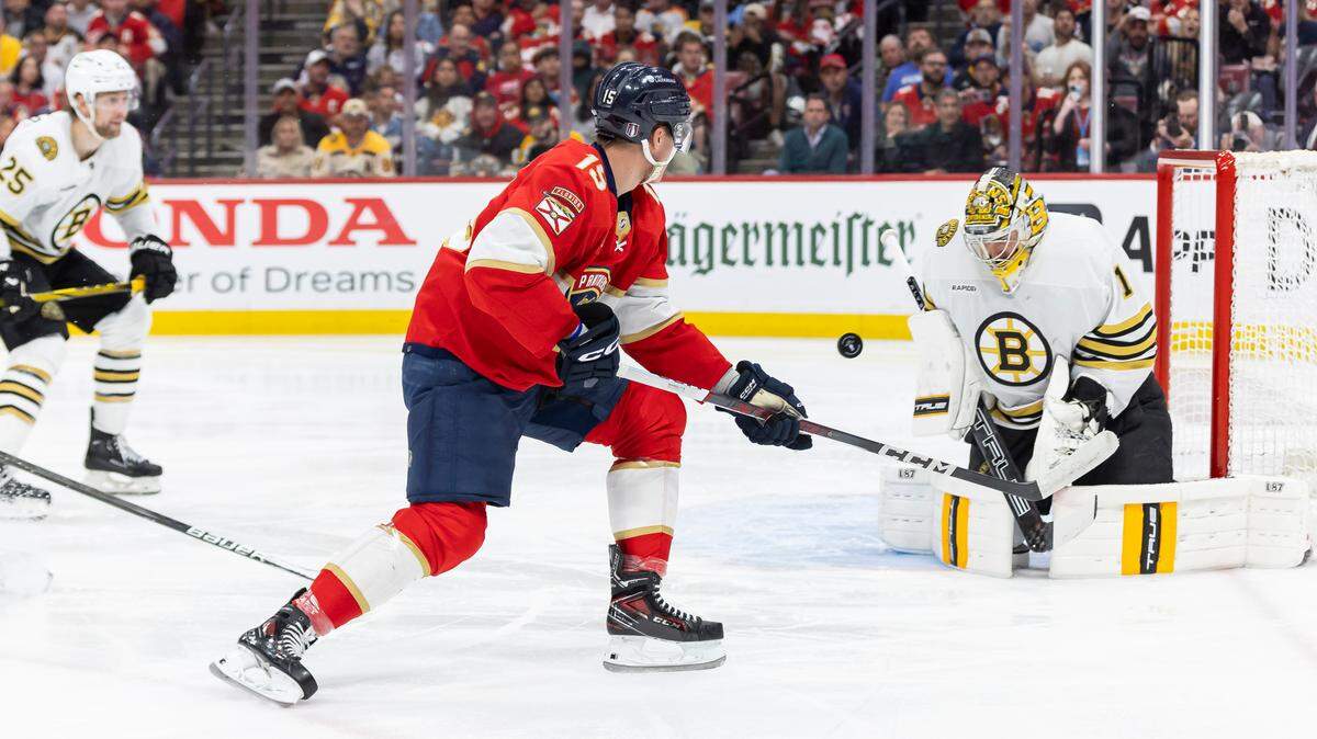 Boston Bruins goaltender Jeremy Swayman (1) blocks a shot by Florida Panthers center Anton Lundell (15) in the second period of Game 1 of the second-round series of the Stanley Cup Playoffs on Monday, May 6, 2024, in Sunrise, Fla.