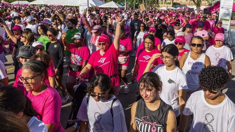 Thousands clad in pink walk in solidarity to raise breast cancer awareness