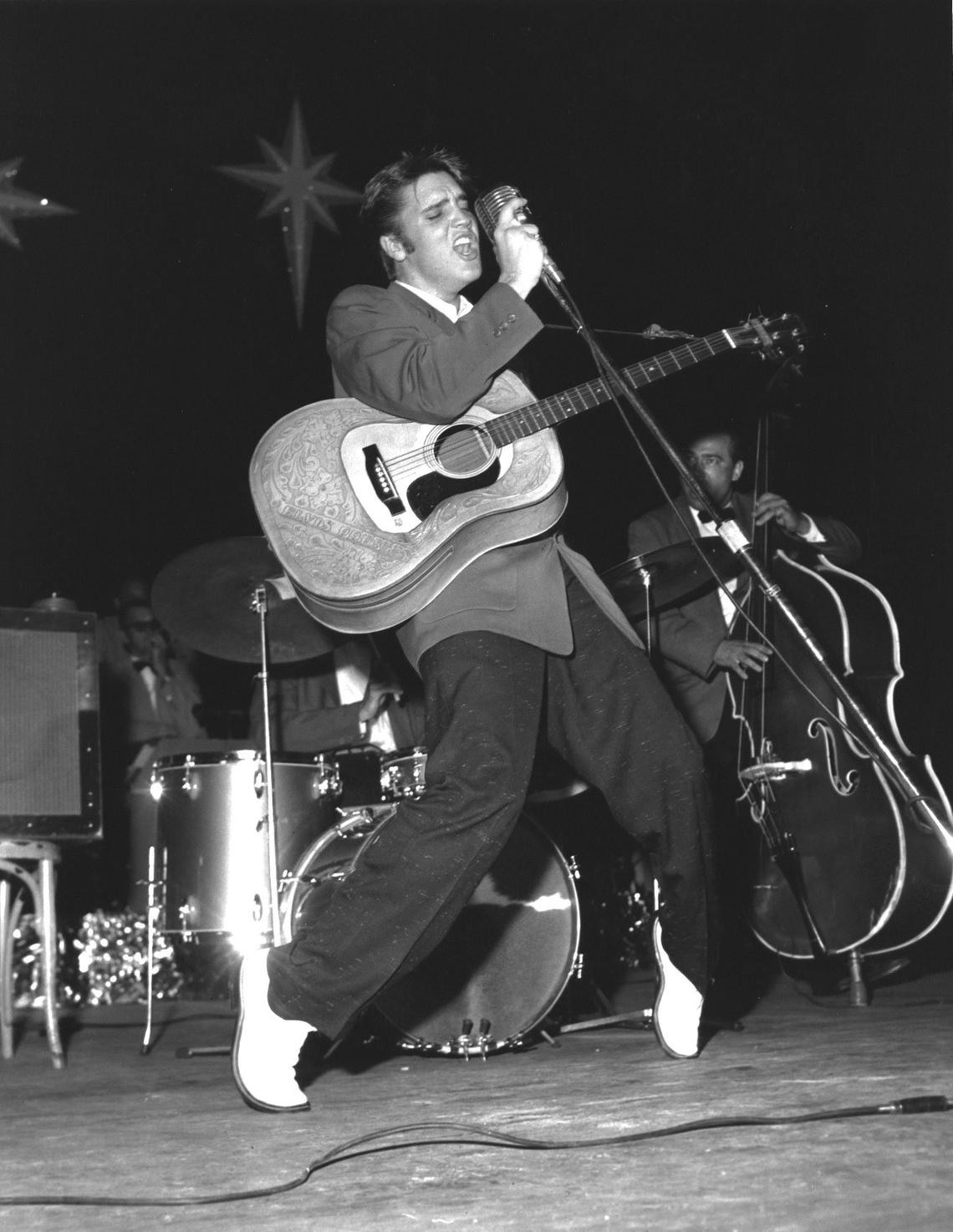 Elvis Presley performing at the Olympia Theater in downtown Miami on Flagler in 1956.