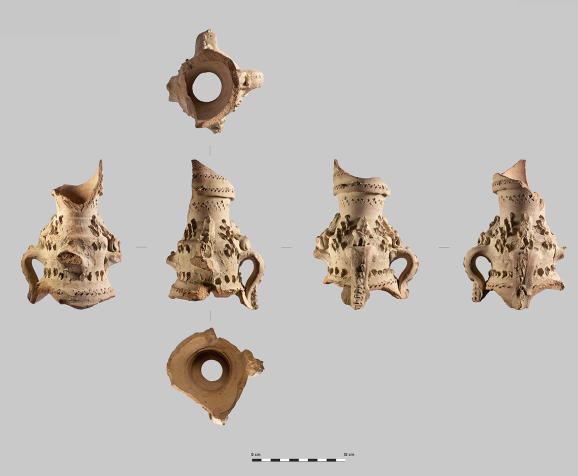 An intricately decorated water jug found at Othman bin Affan Mosque.