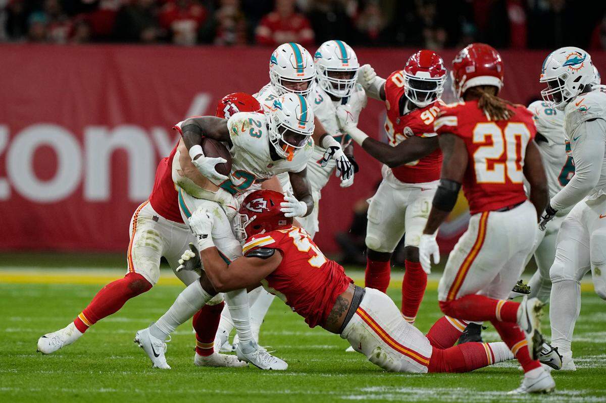 Miami Dolphins running back Jeff Wilson Jr. (23) runs with the ball during the second half of an NFL football game against the Kansas City Chiefs Sunday, Nov. 5, 2023, in Frankfurt, Germany. (AP Photo/Martin Meissner)