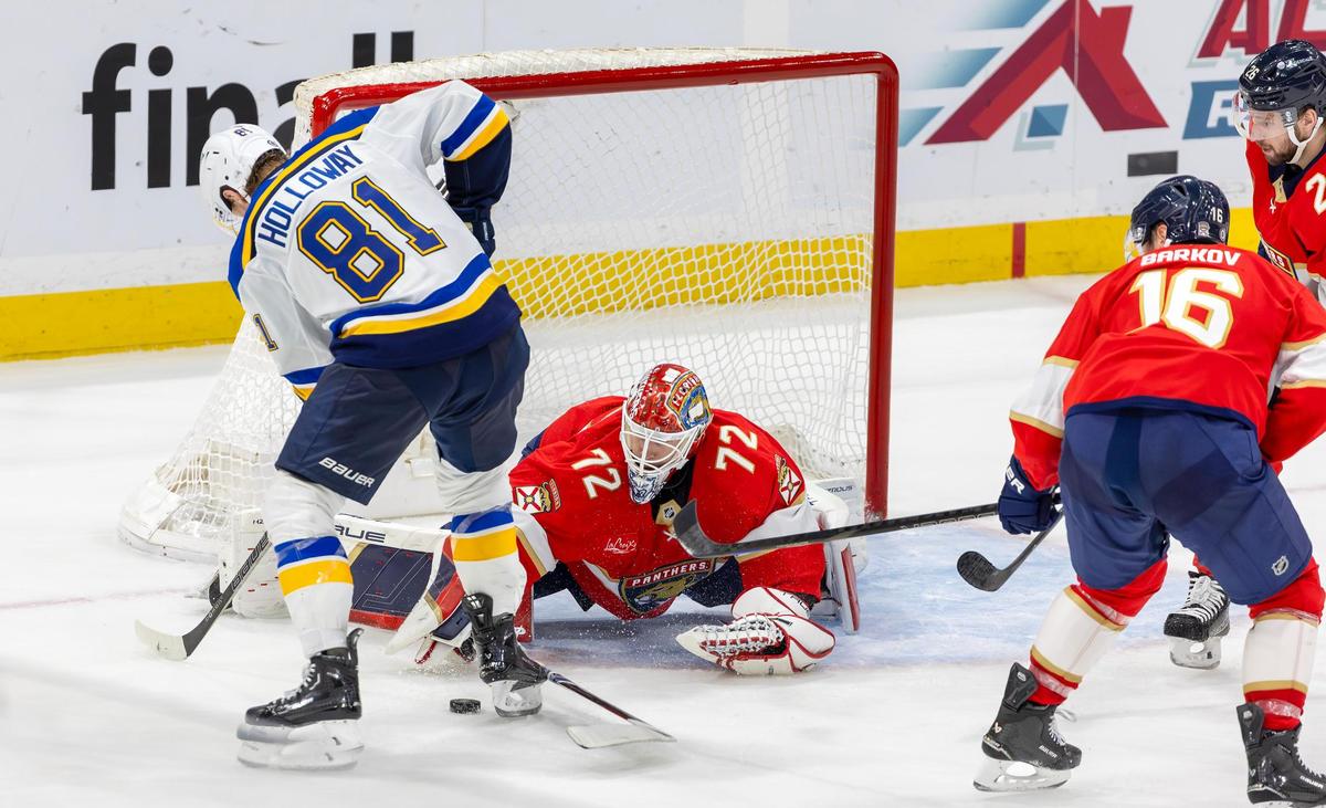 Florida Panthers goaltender Sergei Bobrovsky (72) blocks a shot by St. Louis Blues center Dylan Holloway (81) during overtime of an NHL game at the Amerant Bank Arena on Friday, Dec. 20, 2024, in Sunrise, Fla.