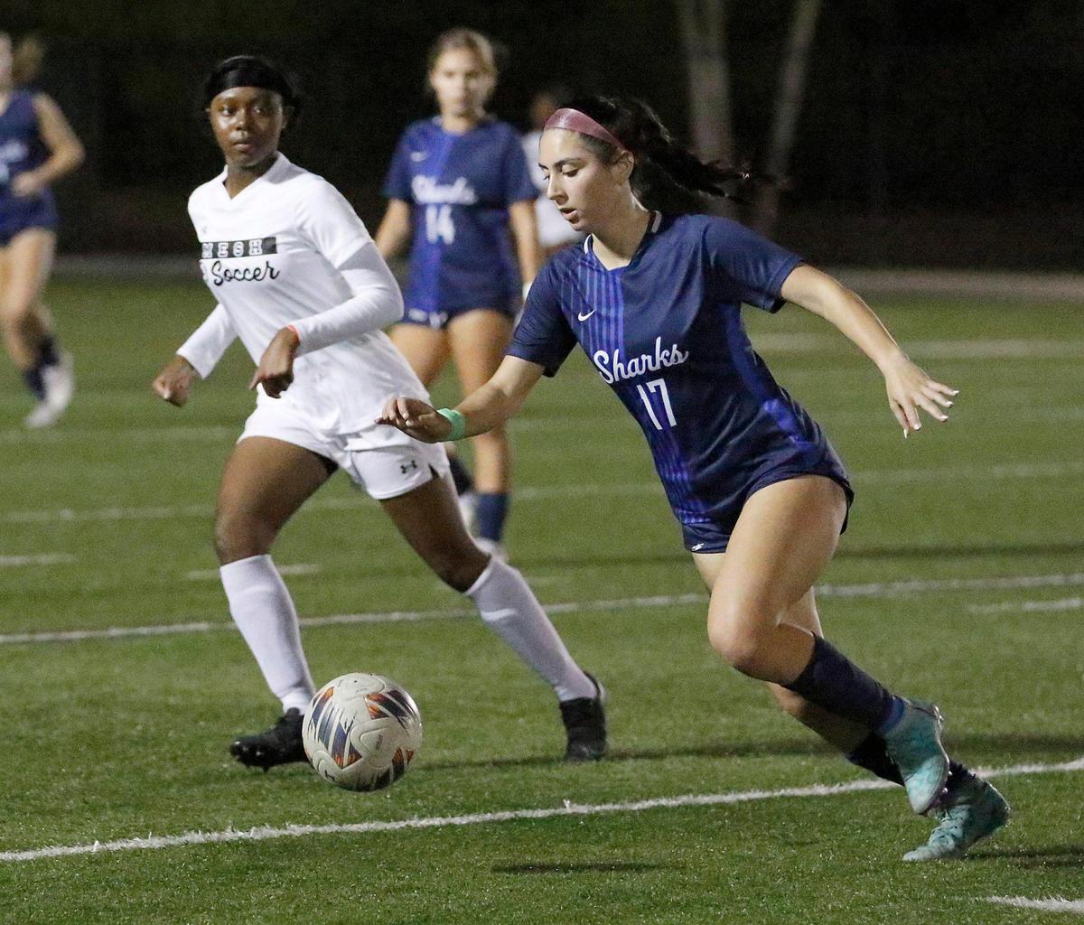 NSU University Sharks Sadie Zelnick (17) controls the ball during the Region 4-3A girls soccer final game against Miami Edison on Wednesday at AutoNation Field in Davie.