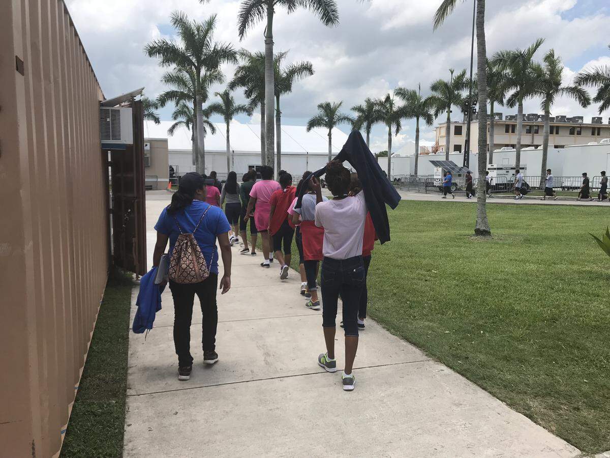 An image released Wednesday night by the Department of Health and Human Services shows children at the Homestead center, where 94 immigrant children who were separated from their parents at the U.S.-Mexico border were being detained by the U.S. government. HHS said the photo was taken earlier Wednesday. The center is holding 1,200 immigrant children.