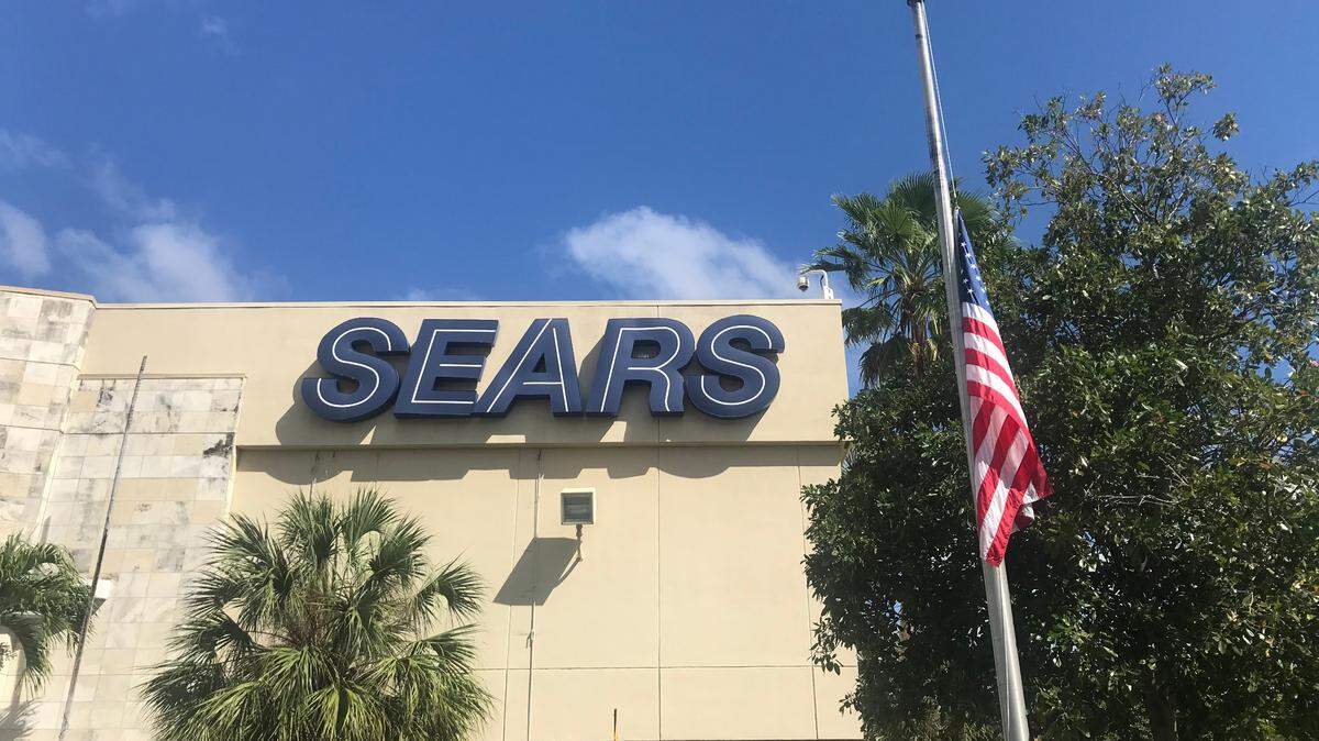 The American flag flies at half-staff at the Coral Gables Sears store out of respect for the more than 500,000 COVID-19 deaths, not controversial talk show host Rush Limbaugh, as Gov. Ron DeSantis has ordered for Florida’s Capitol. 