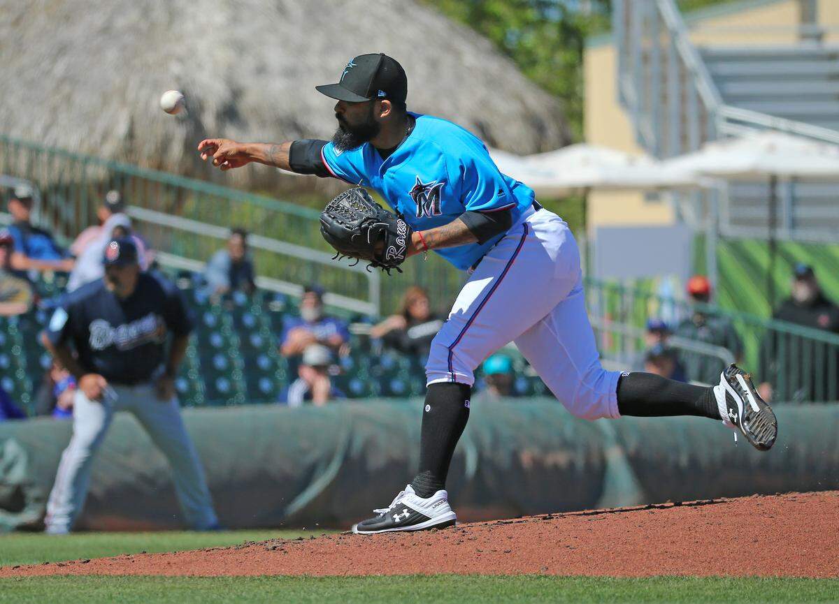 Miami Marlins pitcher Sergio Romo (54) pitches during the third inning of a Major League Baseball spring training game against the Atlanta Braves at the Roger Dean Chevrolet Stadium on Wednesday, March 6, 2019 in Jupiter, FL.