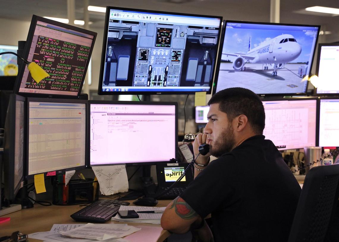 On Thursday, February 7, 2019 maintenance controller John Hernandez handles calls inside the Operation Control Center where Spirit has turned around its departure and arrivals time rankings from the bottom to near the top.