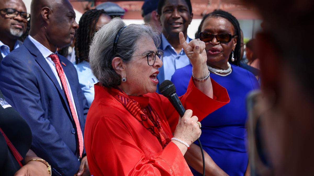 Miami-Dade Mayor Daniella Levine Cava, center, encourages attendees to be active in their support for TPS as Family Action Network Movement (FANM), alongside South Florida partners, led a rally on Sunday, April 26, 2026, calling on federal decision-makers to extend Temporary Protected Status (TPS) for Haitian nationals at the MoCA Plaza in North Miami, Florida. The mobilization comes at a critical moment as the Supreme Court of the United States prepares to hear oral arguments on the administration's attempt to terminate TPS for Haiti. The decision could place more than 350,000 Haitian nationals at risk of losing protection from deportation and work authorization, threatening the stability of their families. The April 26 event in North Miami is part of a broader series of pre-oral argument mobilizations, including actions in Atlanta on April 18 and in Washington, D.C., in front of the Supreme Court on April 29, coinciding with oral arguments.