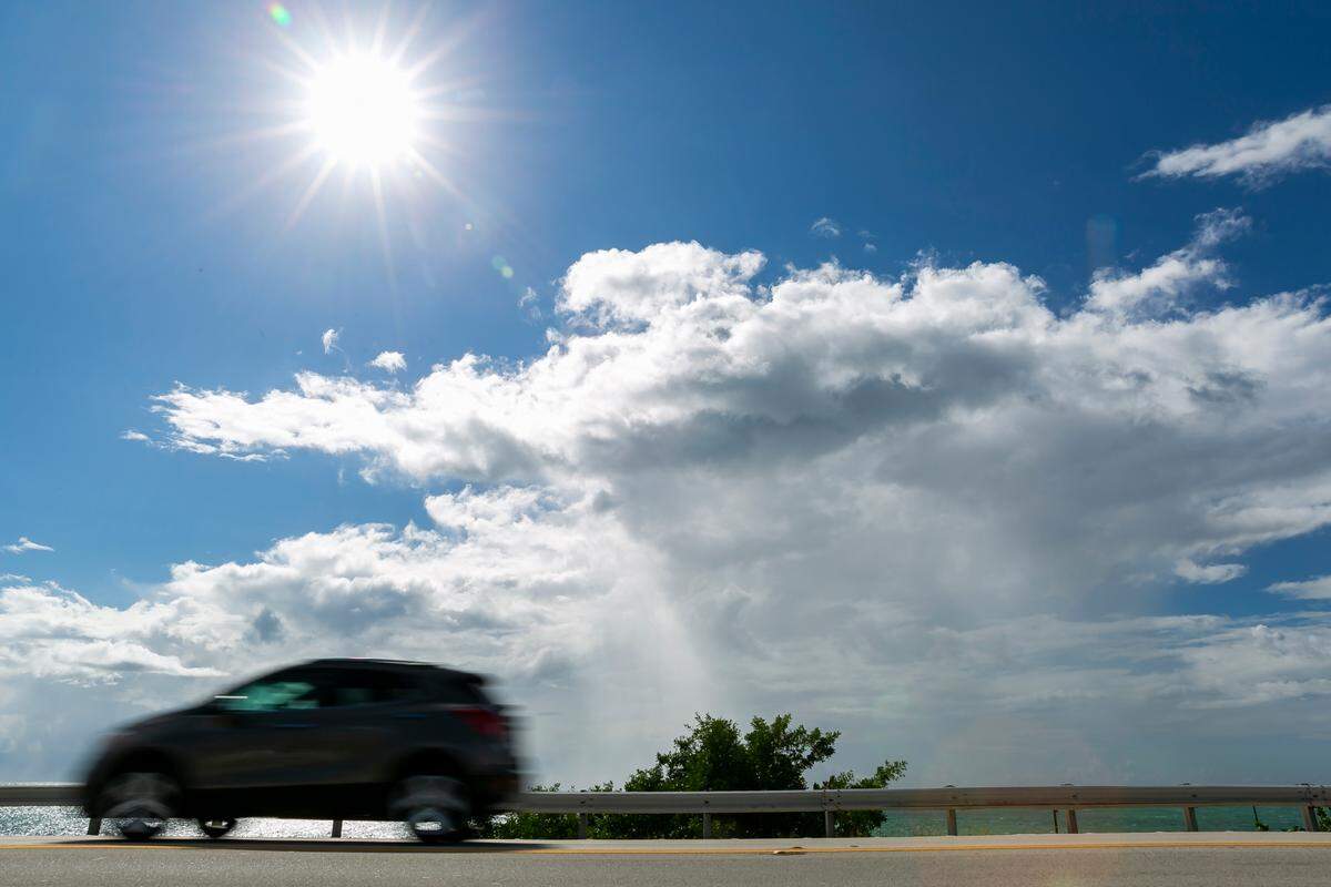 Cars make their way down the Overseas Highway near the Channel 2 Bridge in Islamorada, Florida on Tuesday, October 12, 2021.