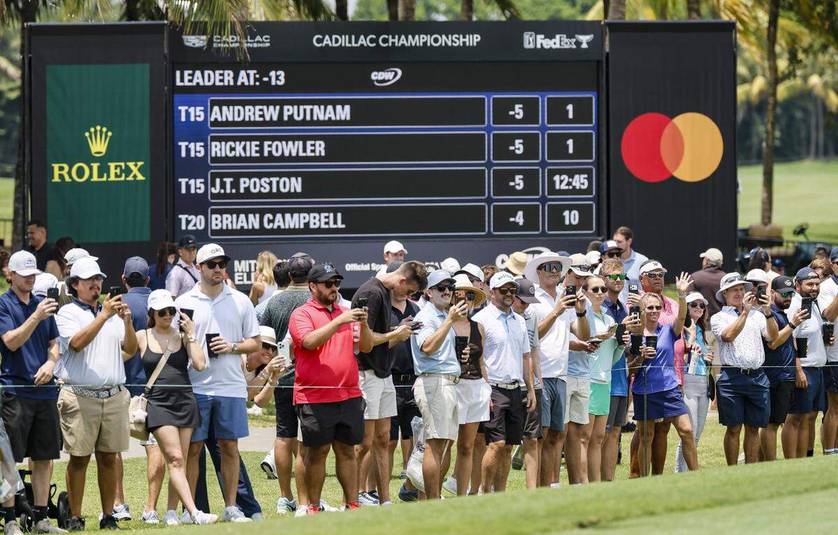 PGA fans watch the players on the fairway at hole 1 during the 2026 Cadillac Championship at Trump National Doral in Doral, Florida, on Saturday, May 2, 2026.