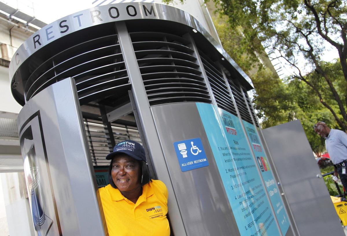 Cassandra Strozier, 54, who was once homeless, is now gainfully employed as an attendant who helps operate and clean the first downtown public restroom near the entrance to Miami-Dade Main Library.