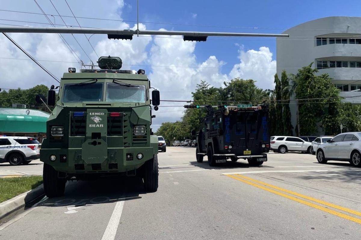 Miami-Dade County police vehicles arrived in Coconut Grove Friday morning as police searched for two people suspected of a shooting in Coral Gables. This photo was taken shortly after noon at the intersection of Southwest 27th Avenue and Bird Avenue, about a block from the Flanigan’s restaurant in the Grove.