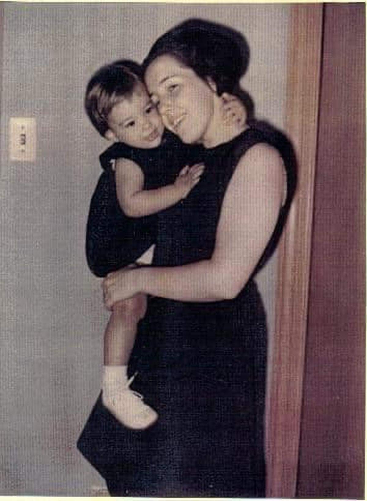 A 1964 photo of Ann Murray, who has represented District 1 on the Broward School Board since 2008, hugs her daughter, Marie Murray Martin, a candidate vying to replace her mom.