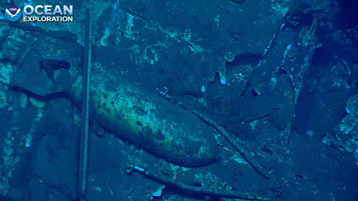 The Douglas SBD Dauntless dive bomber was trapped inside the USS Yorktown with this bomb still attached to its cradle. The aircraft carrier was sunk by a Japanese submarine after the 1942 Battle of Midway.