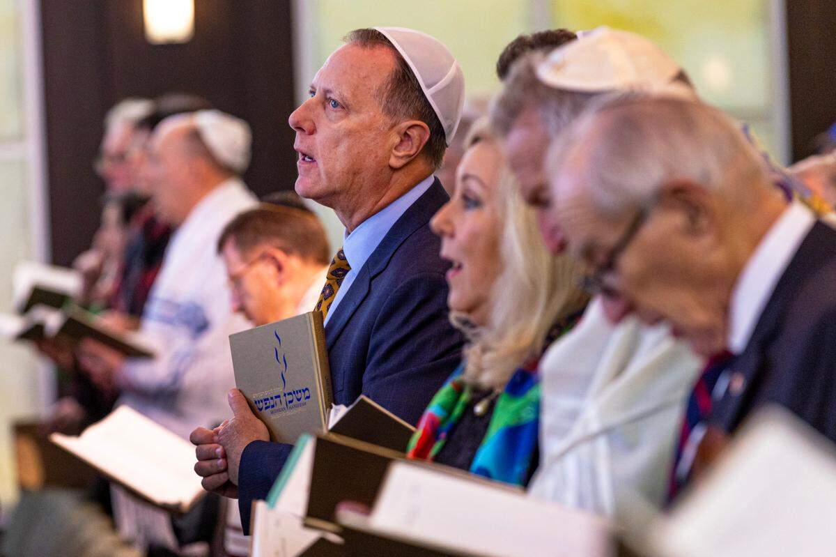 Temple Judea members recite prayers from the ‘Machzor,’ a Jewish prayer book that contains a set order of prayers.