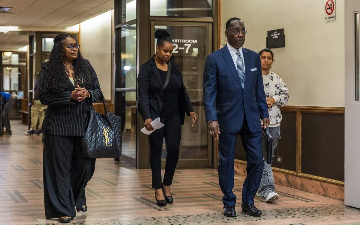 Precious Bland ( second from left), who was found not guilty by reason of insanity of killing her 1-year-old daughter back in 2021, walks out of the courtroom with from left- paralegal Latoya Coleman, defense attorney Larry Handfield and her daughter Ahlona Willis during a hearing in front of Judge Miguel de la O, in Courtroom 2-4, at the Richard E. Gerstein Justice Building, on Wednesday July 15, 2026.