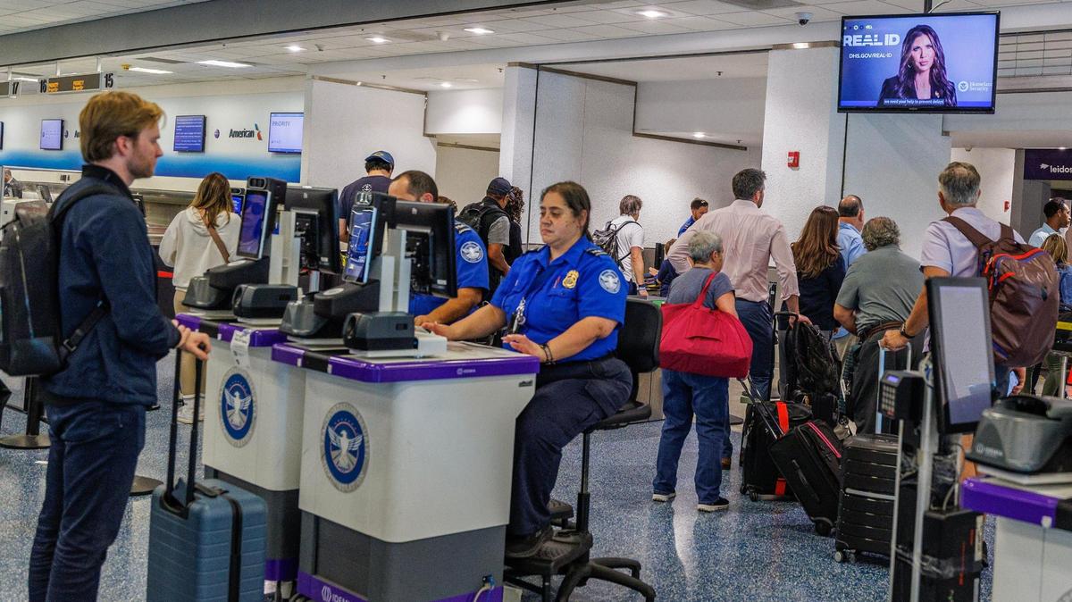 TSA agents check in passengers on Wednesday, May 7, 2025.