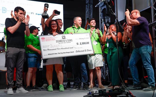 BurgerFi wins the The Very Best Burger Award during the Burger Bash at the South Beach Wine & Food Festival.