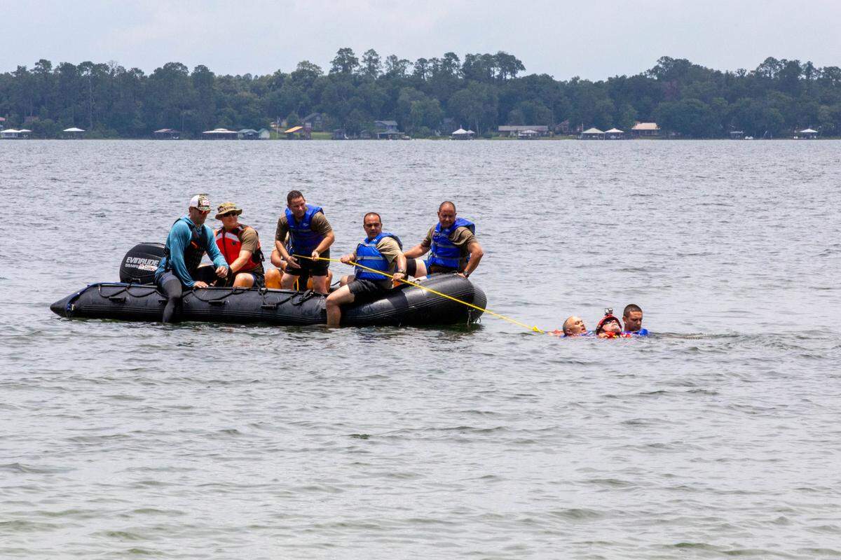 Florida State Guard recruits receive aquatic skills instruction from Florida National Guard soldiers and civilian contractors to execute a water survival training exercise at Camp Blanding, Florida, June 14, 2023. Soldiers with the 53rd Infantry Brigade Combat Team, 83rd Troop Command, and 50th Regional Support Group supplemented the multi-day training that included rescue swimming, entering and exiting water vehicles, water survival techniques and water vehicle maneuvering.