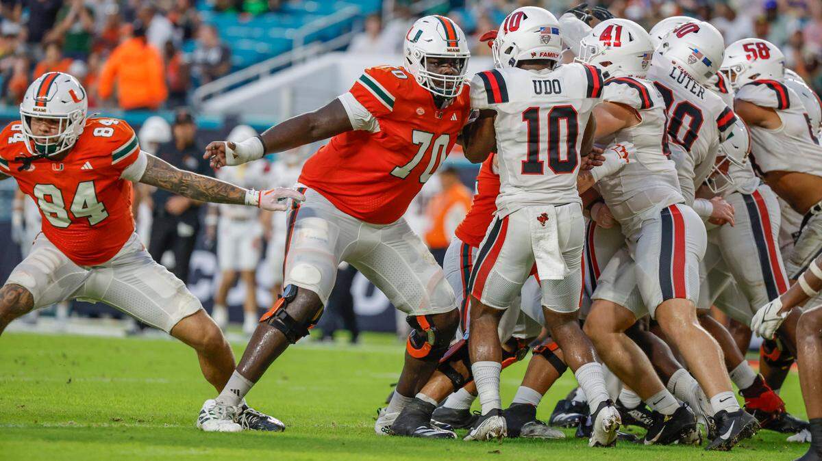 Miami Hurricanes offensive lineman Markel Bell (70) blocks against the Ball State Cardinals in the first half of an NCAA football game at Hard Rock Stadium in Miami Gardens, Florida on Saturday, September 14, 2024. 