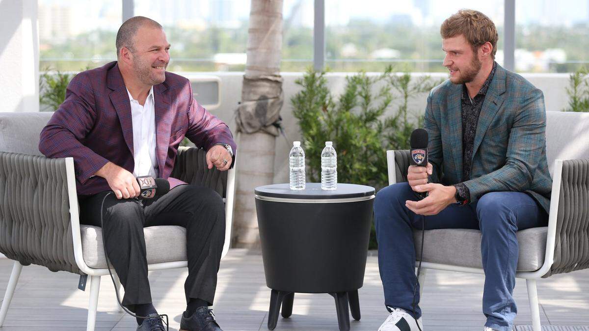 Florida Panthers General Manager Bill Zito speaks with Aleksander Sasha Barkov who signed an eight-year contract extension with the Panthers. The team captain settled the new deal at the Courtyard by Marriott in Fort Lauderdale on Friday, October 8, 2021. 