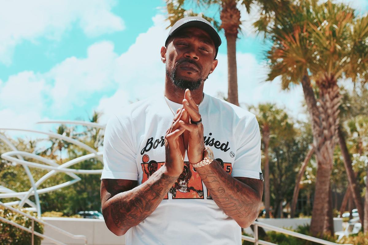 Miami Heat player Udonis Haslem wears one of the shirts in his new clothing line.