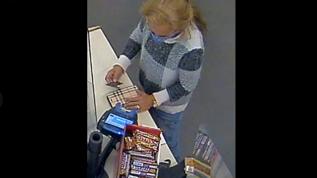 The Hugging Bandit caught on surveillance camera using a stolen credit card