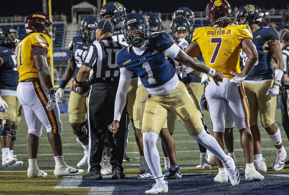 Florida International University Panthers quarterback Keyone Jenkins (1) reacts after scoring against the Bethune Cookman Wildcats at FIU's Pitbull Stadium in Miami, Florida, on Friday, August 29, 2025.