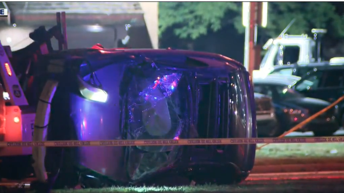 A woman was found dead next to a crashed vehicle after the driver fled, Philadelphia cops say.