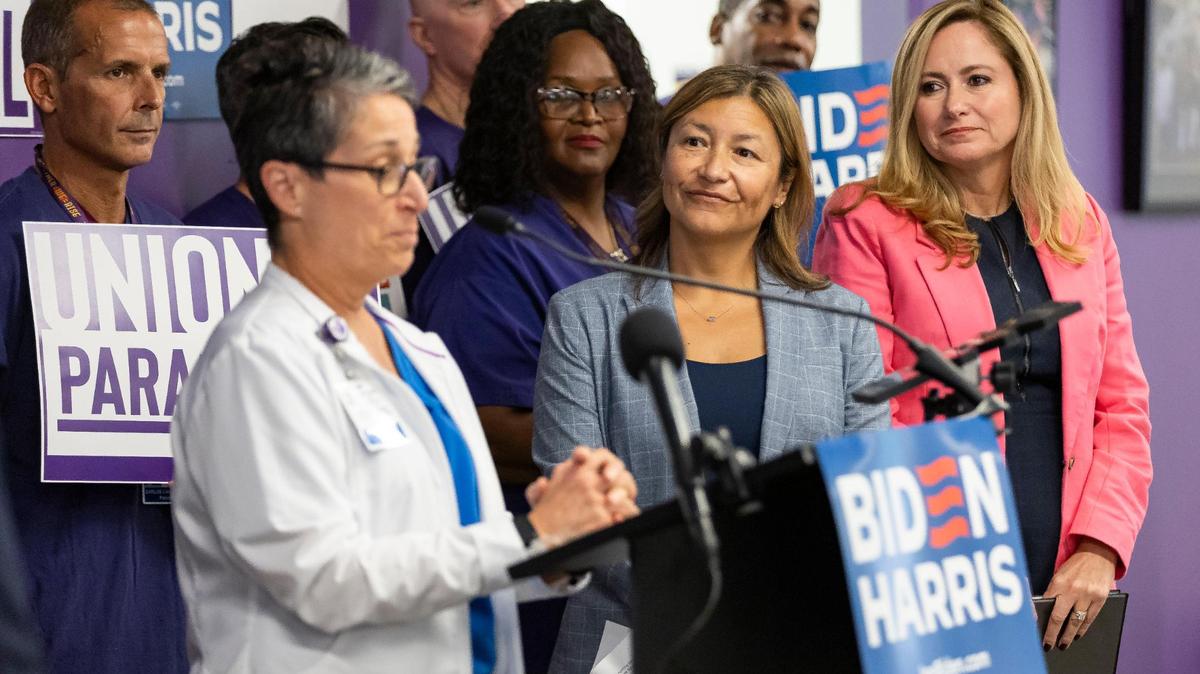 Biden-Harris 2024 National Campaign Manager Julie Chavez Rodriguez listens to SEIU 1991 President Vicky Gonzalez speak during a press conference at the SEIU 1991 on Tuesday, Nov. 7, 2023, in Miami, Fla. The event was held ahead of Donald Trump’s trip to Hialeah and the third GOP Primary Debate on Wednesday.