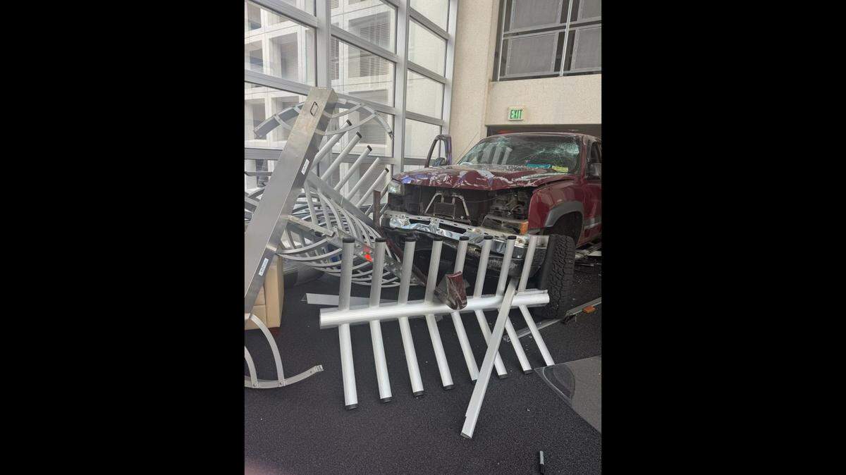 A 70-year-old man took things to extremes after being denied entry at a financial services office, strapping on a helmet and crashing into the building, according to investigators in Florida.