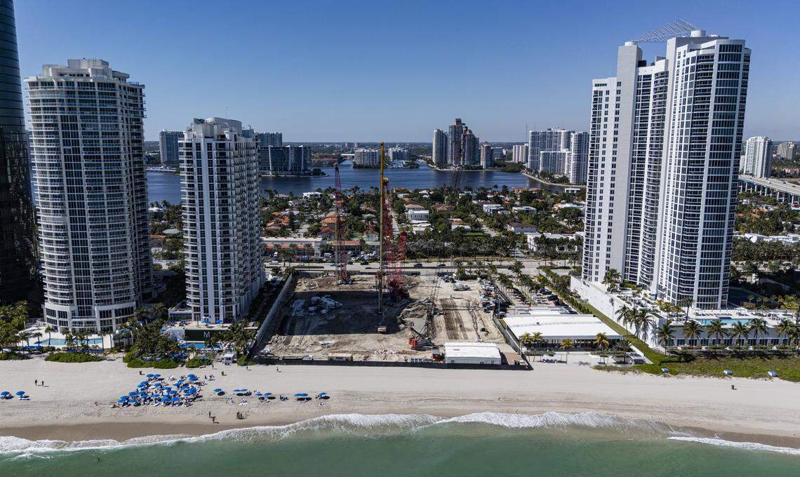 An aerial view of the St. Regis construction site next to the Ocean Three Condo, far-right, and the M Resort Residences Condo as they sit near the coastline on Friday, Oct. 31, 2025, in Sunny Isles Beach, Fla.