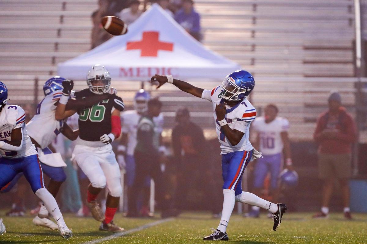 Hialeah Thoroughbreds quarterback Travis Delaney Jr (7) throws the football against the North Miami Pioneers during the first quarter of a high school football game at Ted Hendricks Stadium at Milander Park in Hialeah, Florida, Wednesday, October 11, 2023.
