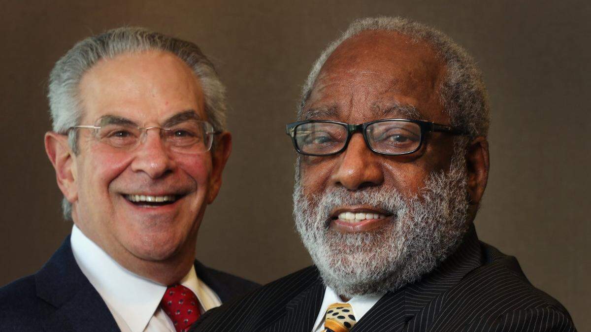 Lawyers Alan Kluger, left, and H.T. Smith, have created a scholarship named after Smith to bring diversity into the legal profession.