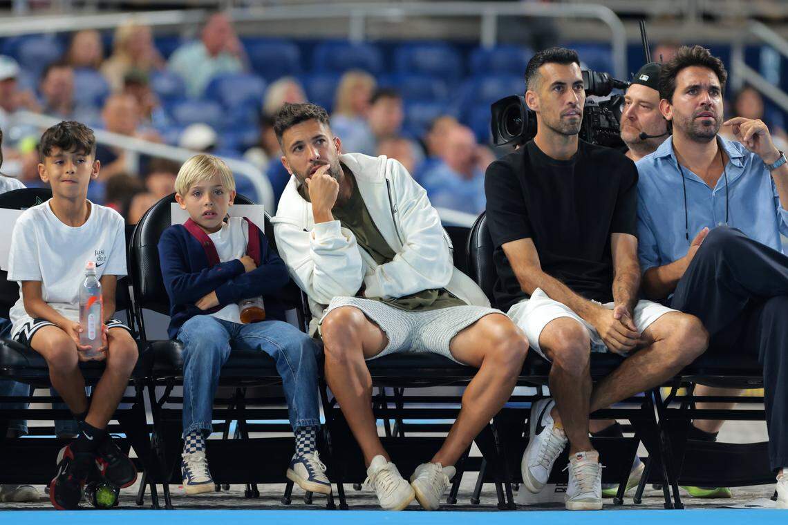 Inter Miami CF former players Jordi Alba and Sergio Busquets watch an exhibition match with their kids between Jessica Pegula and Amanda Anisimova at the Miami Tennis Invitational on Monday, Dec. 8, 2025, at loanDepot Park in Miami, Fla.