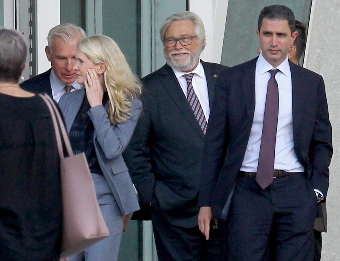 Carnival Corporation Chairman Micky Arison, Chief Strategy Officer Josh Leibowitz, and President of Princess Cruises Jan Swartz leave the Wilkie D. Ferguson Jr. Federal U.S. Courthouse, after a hearing on probation violations on Wednesday, October 2, 2019.