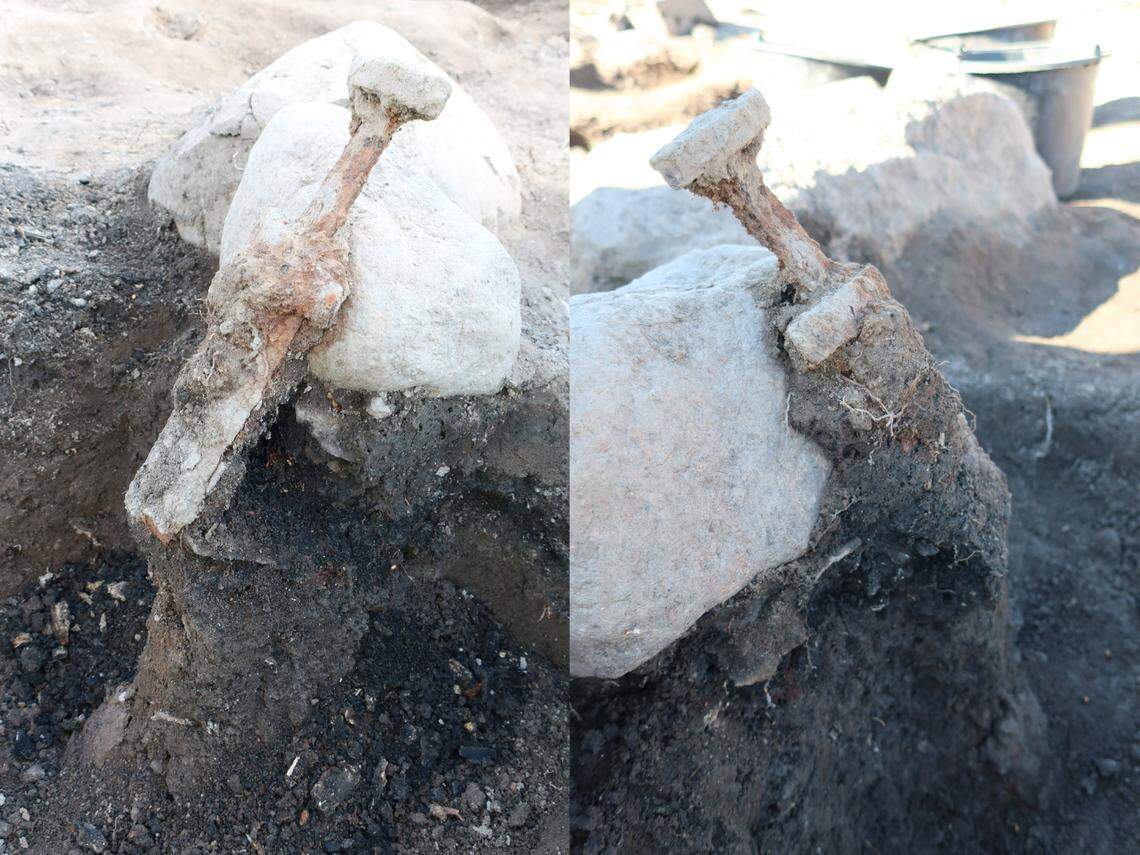 One of the swords as archaeologists began to remove it from the ground.