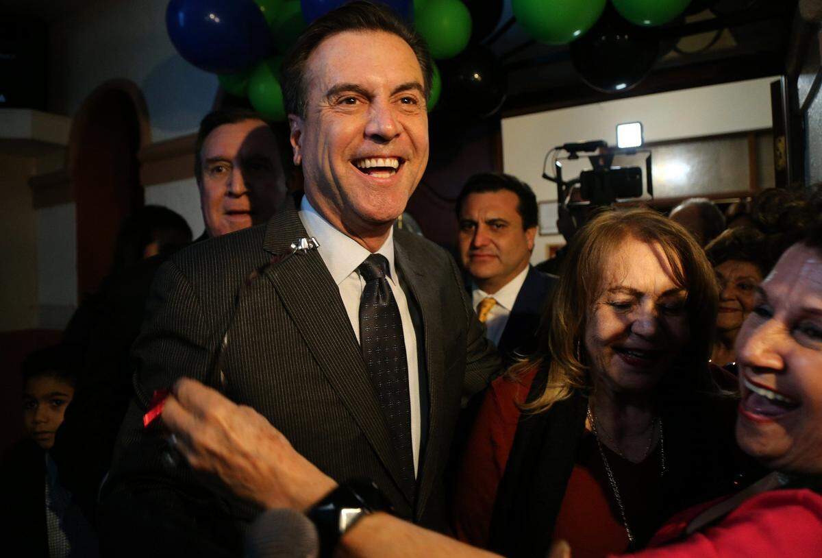 Candidate Alex Diaz de la Portilla celebrates his victory in the runoff election for City of Miami District one with his family and friends, in Miami, on Tuesday, November 19, 2019.