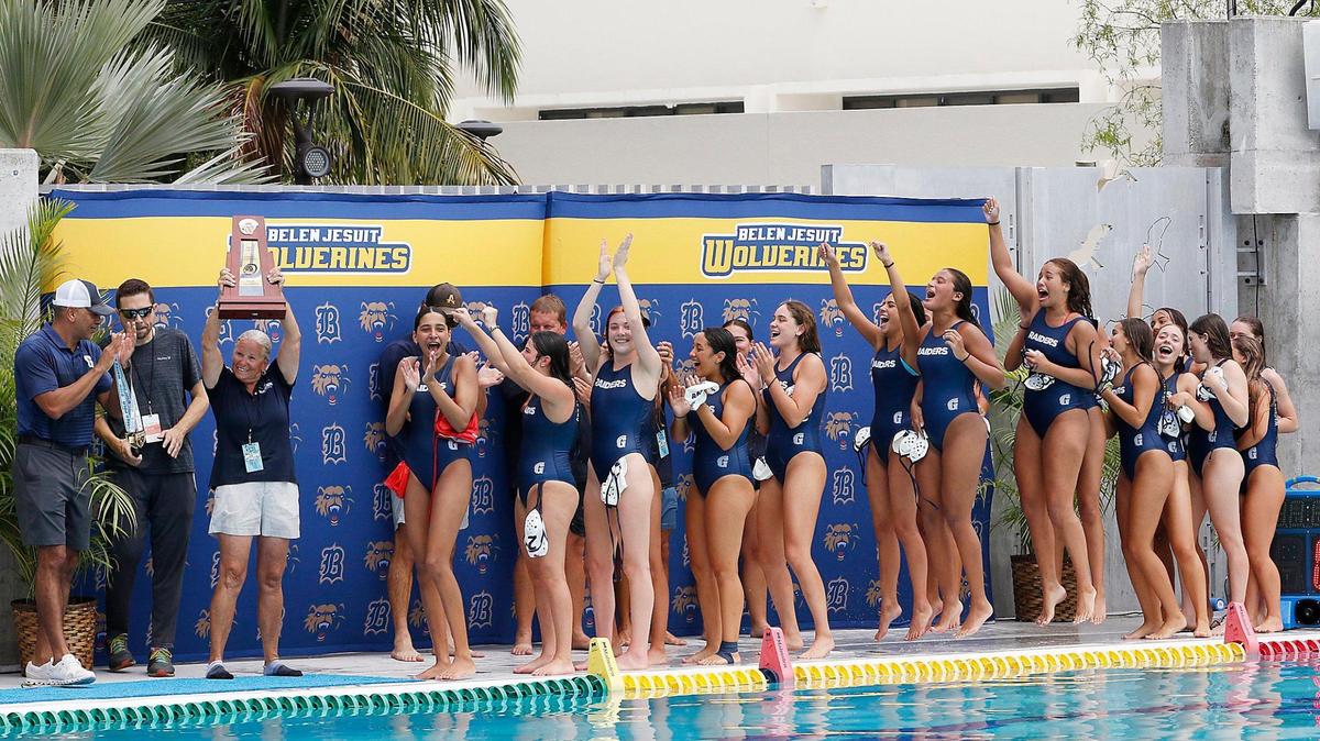 Gulliver Prep team celebrates a victory during the FHSAA Girls Water Polo State Championships final match against Seminole Noles (Sanford) on Saturday, April 26, 2025 at Gian Zumpano Aquatic Center in Miami. Andrew Uloza / for Miami Herald