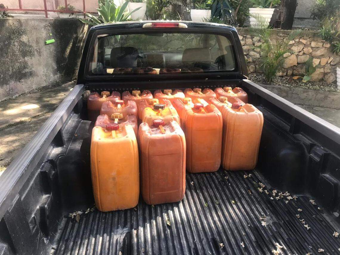 The back of seafood exporter Charles-Edouard Denis’ Nissan pickup in Haiti, where he spends his days driving around searching for diesel to stock up due to an ongoing fuel shortage.