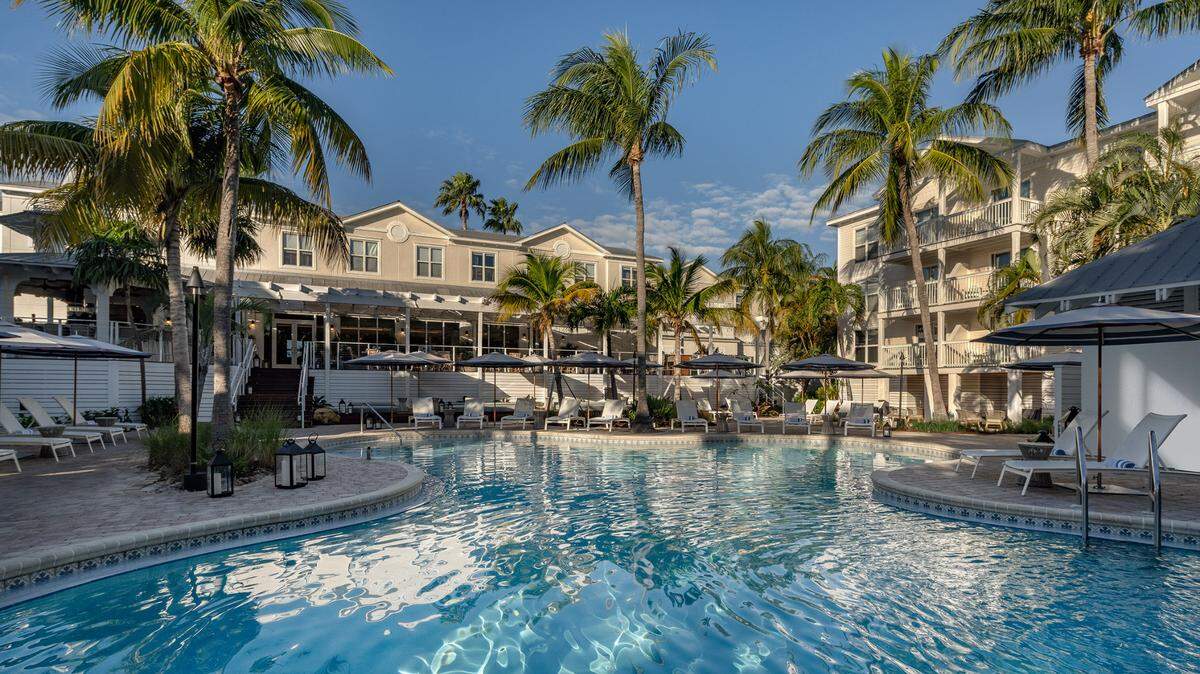 You can now reserve a room and swim in the lagoon-style pool at Margaritaville Beach House in Key West.