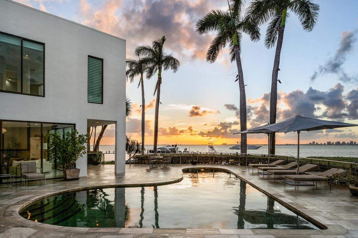 The five-bedroom Key Biscayne home features a “piano-shaped” swimming pool.