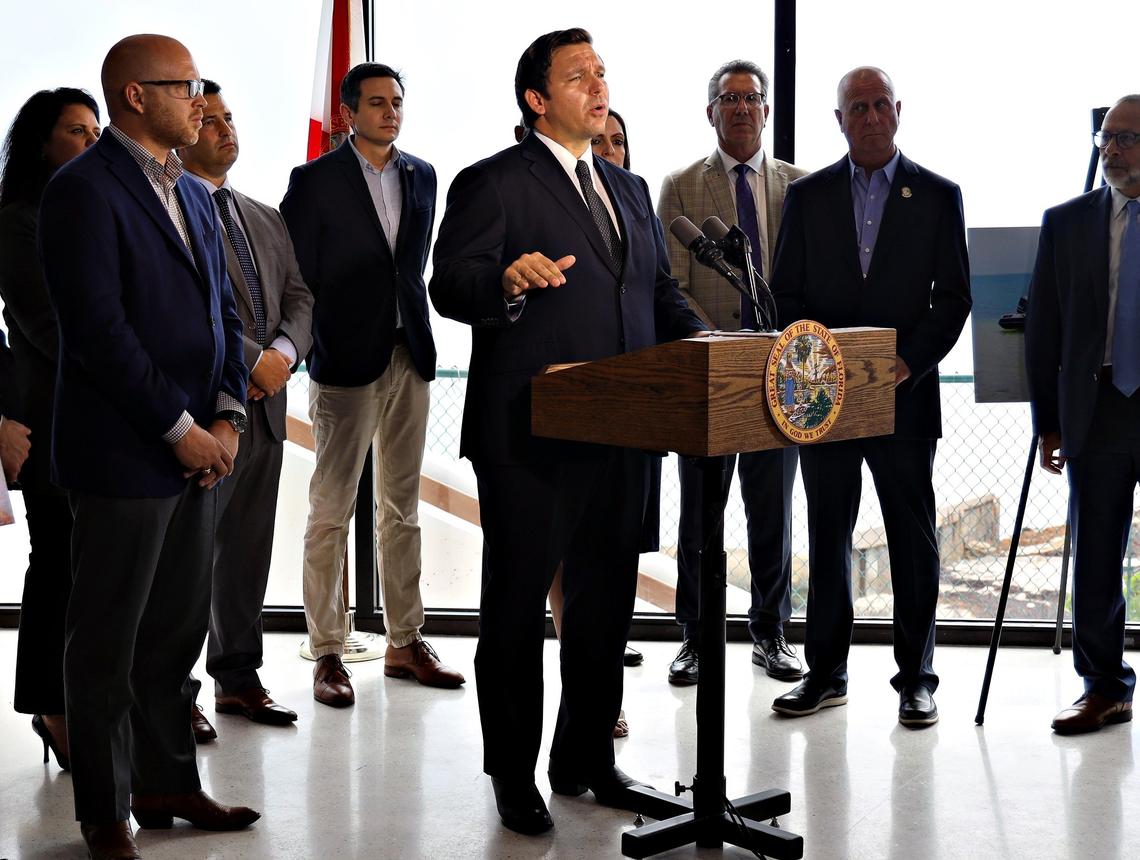 Flanked by state government and private environmental stakeholders, Gov. Ron DeSantis holds a press conference at the University of Miami’s Rosenstiel School of Marine and Atmospheric Science regarding funding for his environmental initiatives on Tuesday, May 7, 2019.
